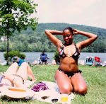 Natalie and Sarah sunbaking, Connecticut, New York 2008 by Ella Condon